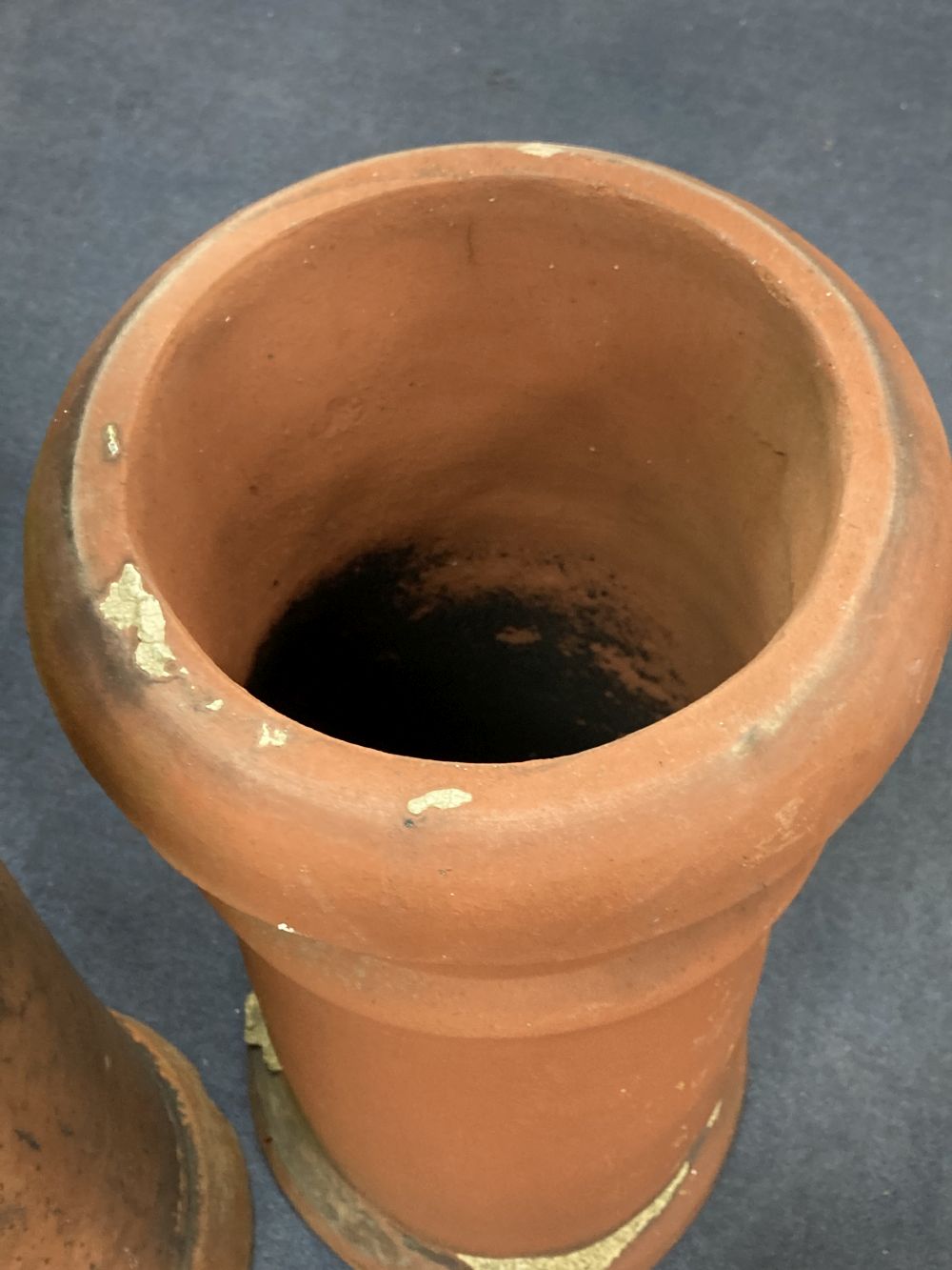 Two terracotta chimney pots, tallest 77cm